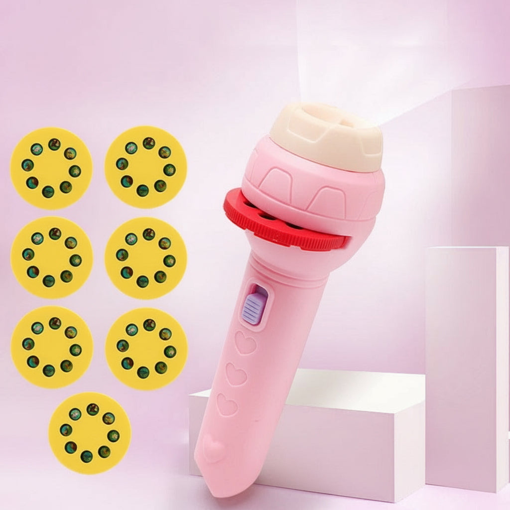 Pink flashlight projector toy with yellow projection wheels on a pink background